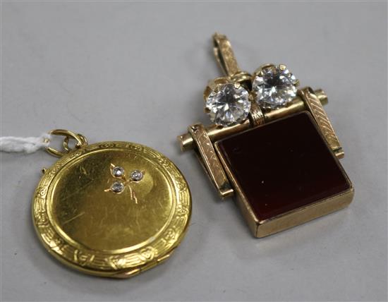 A yellow metal locket, a carnelian and bloodstone fob seal and a pair of ear studs.